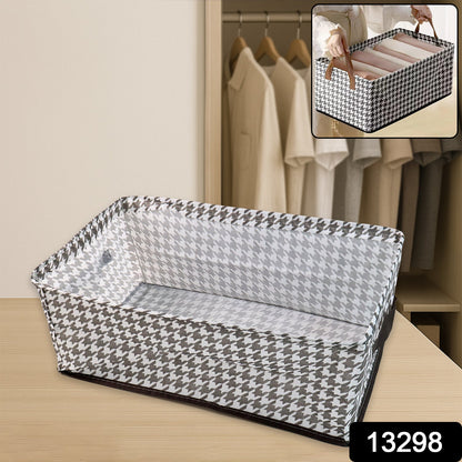 Stylish fabric storage bin placed on a wooden shelf, perfect for organizing clothes or linens.